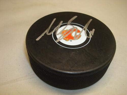 Микаел Баклунд подписа хокей шайба Калгари Флеймс с автограф на 1C - за Миене на НХЛ с автограф